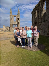 Spottiswoode family standing in St Andrews, Scotland